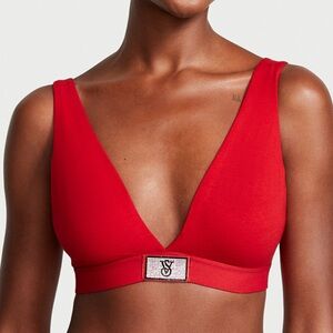 Victoria’s Secret red bedazzled logo bra